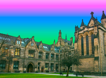 A historic university building with bright colored gradient background
