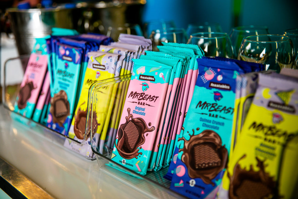 A close up of several MrBeast Feastables chocolate bars on display