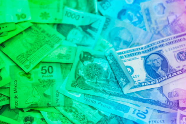 Pile of global currencies with transparent rainbow overlay