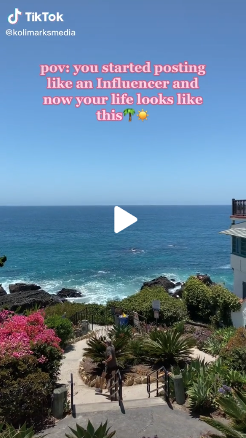 Ocean scene with blue skies and greenery reading pov: you started posting like an Influencer and now your life looks like this