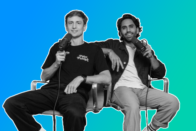 Creators Colin and Samir sitting down in black and white on a green and blue gradient background