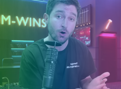 Creator Attorney Tom speaking into a microphone with a rainbow gradient overlay