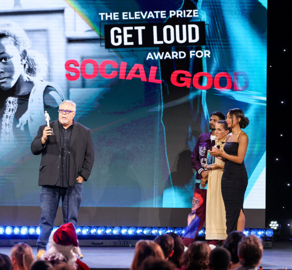 Mark Horvath, founder of Invisible People, giving a speech on stage after accepting his The Elevate Prize Get Loud Award for Social Good at the 2023 Streamy Awards
