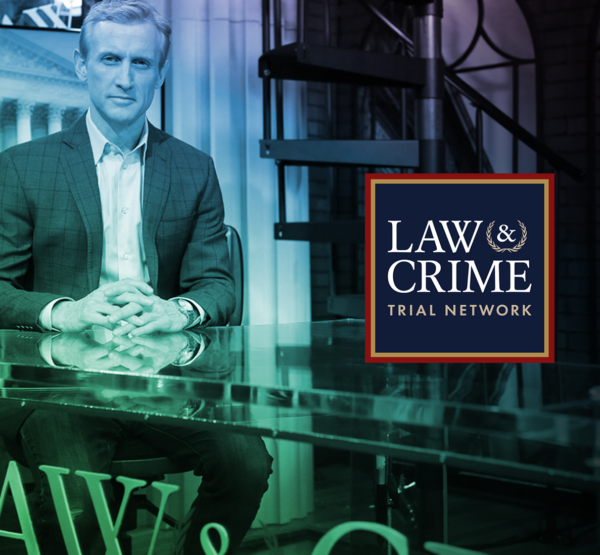 Law&Crime Network founder Dan Abrams sitting at a desk with Law&Crime and Jellysmack logos