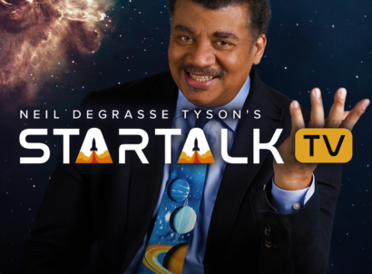 Neil deGrasse Tyson smiling in front of a galaxy background with StarTalk TV logo